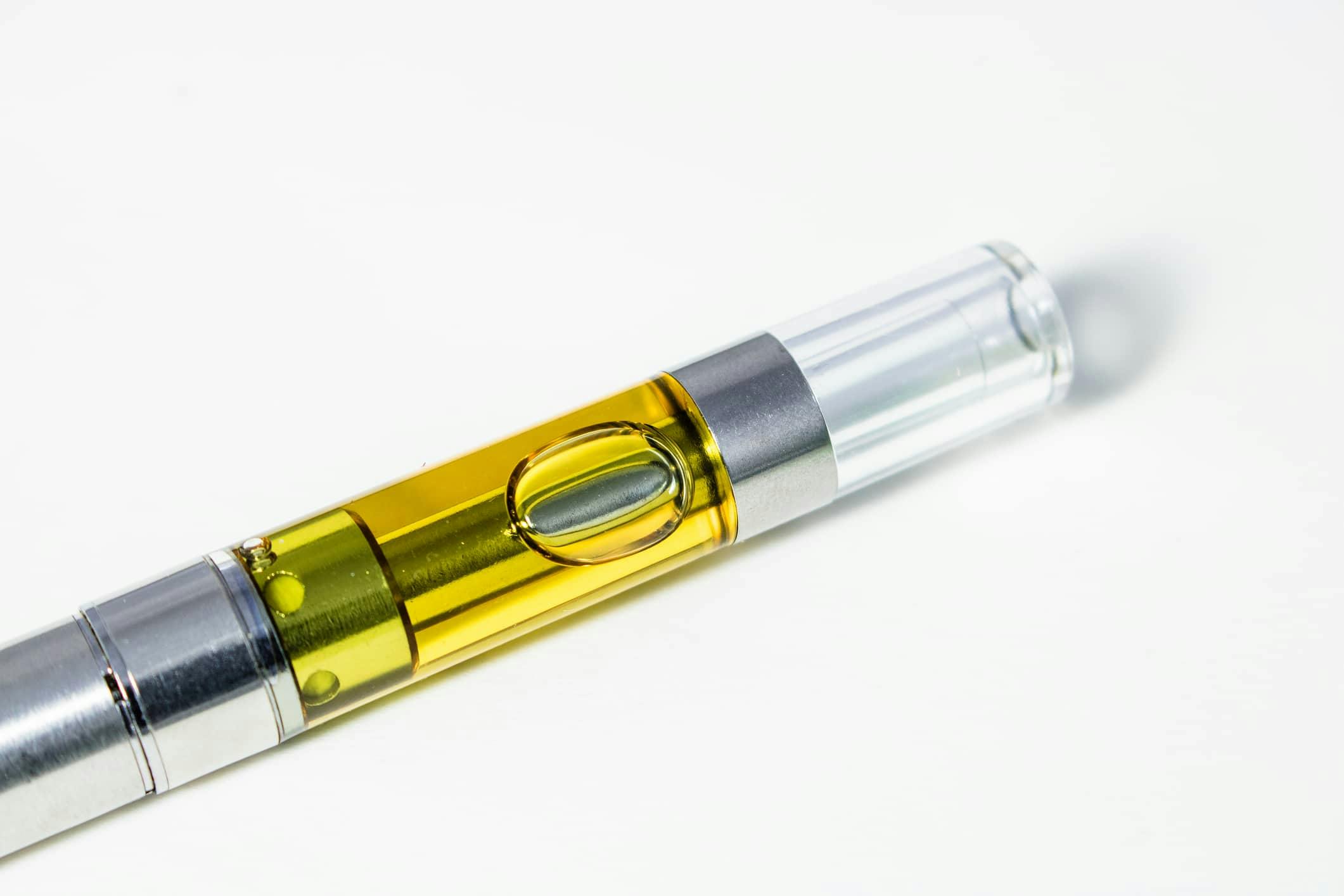 Vape Pen Isolated Up Close – THC & CBD Cannabinoids Concentrated Into Oil Liquid Extract